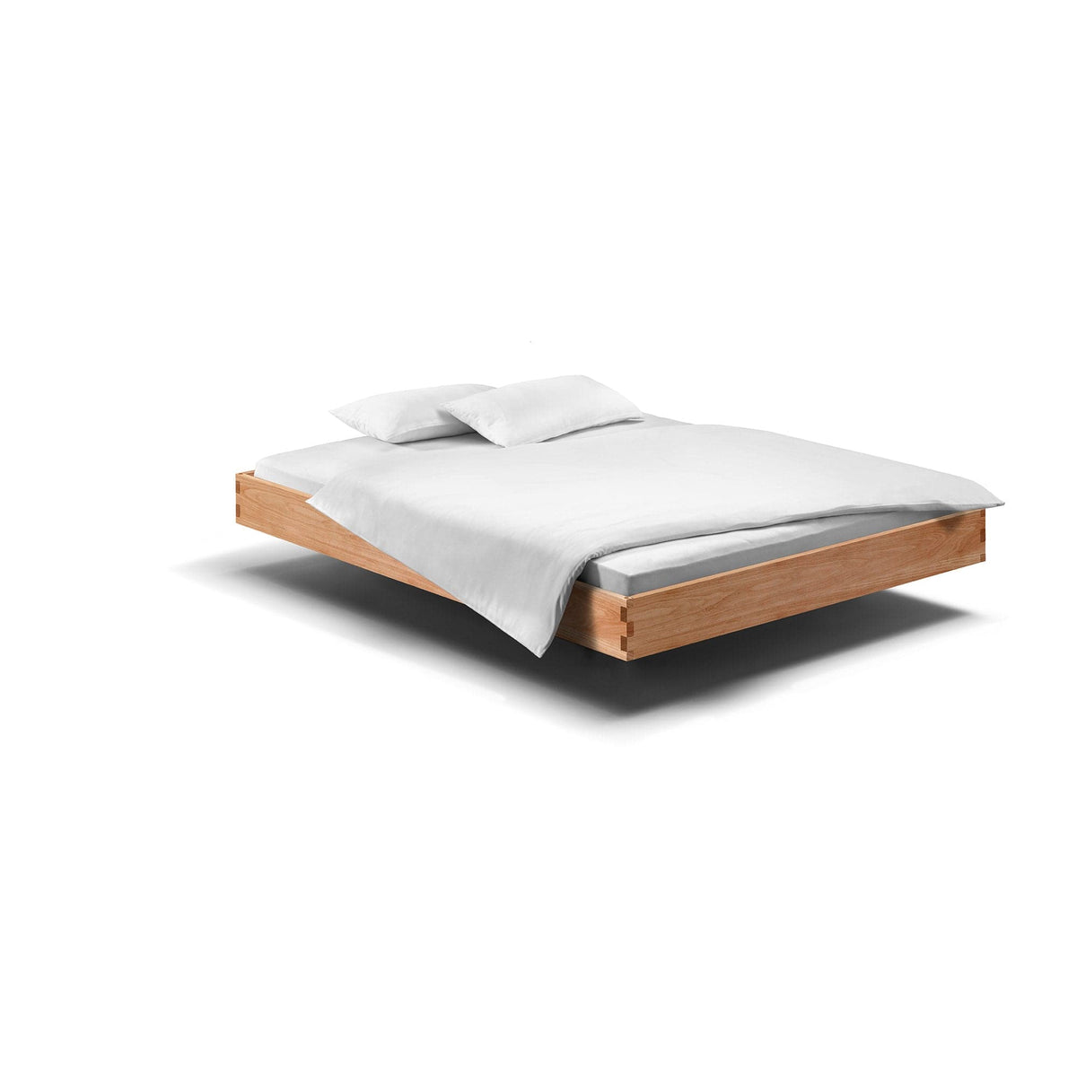 PADIO pur Buche: Schwebendes Holzbett 180x200, eines unserer Massivholz Betten ohne Kopfteil.