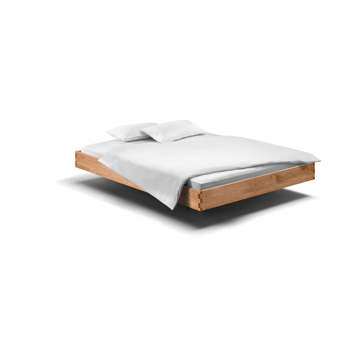 PADIO: Schwebendes Massivholzbett 180x200, eines unserer Holzbetten aus  Eiche ohne Rückenlehne.