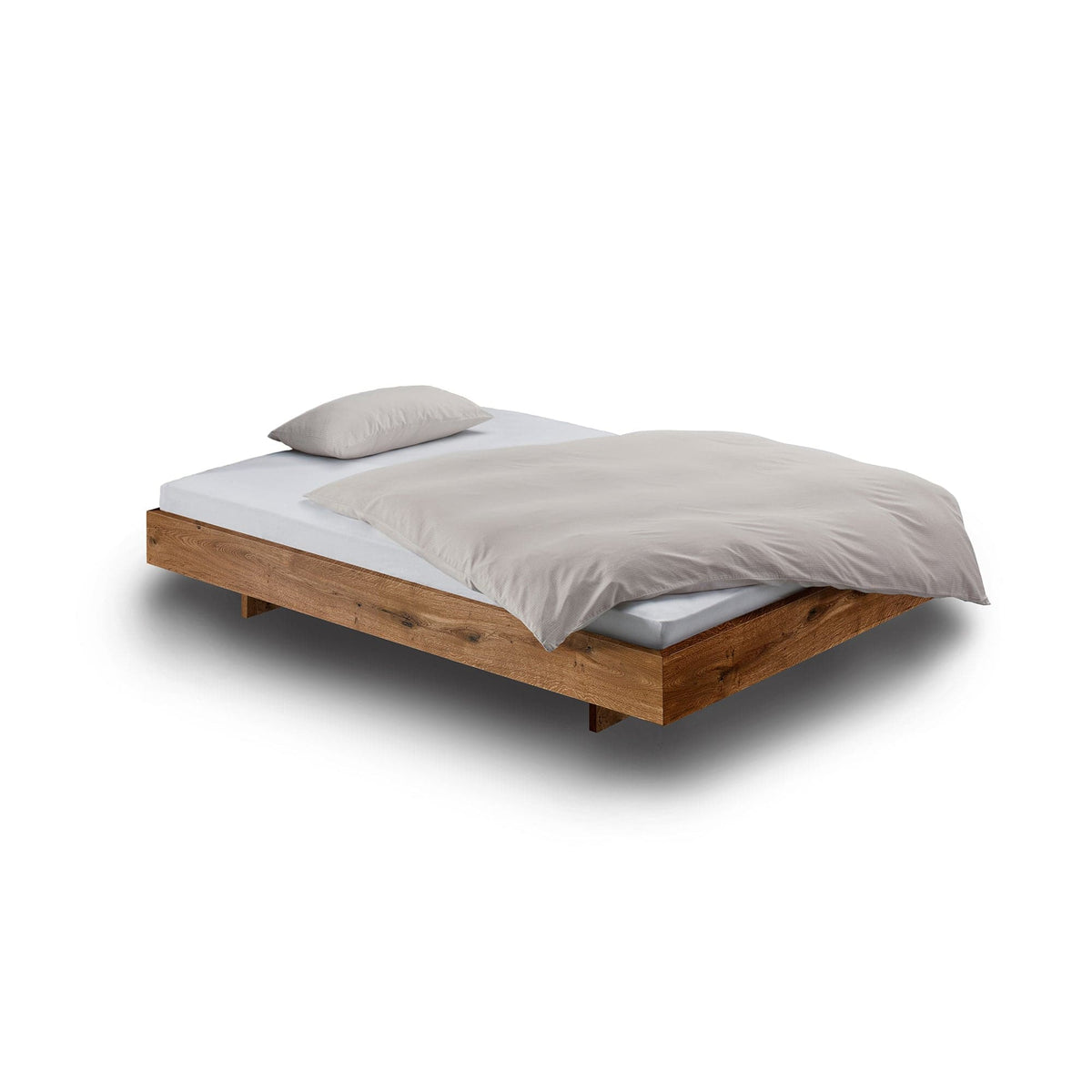 Holzmanufaktur Bett STEP-G Massivholzbett ohne Kopfteil aus Wildeiche